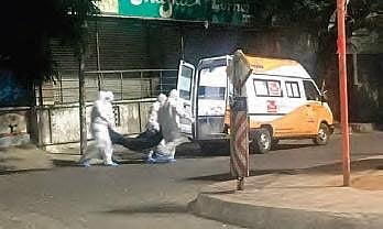 Medical staff carry Govind’s body