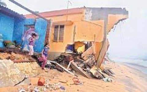 File picture of a house damaged in sea attack