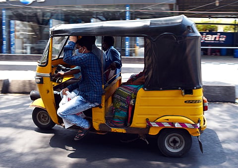 An auto carries more than two passengers at a time, in violation of the lockdown, at Srinagar Colony in Hyderabad on Tuesday | S Senbagapandiyan