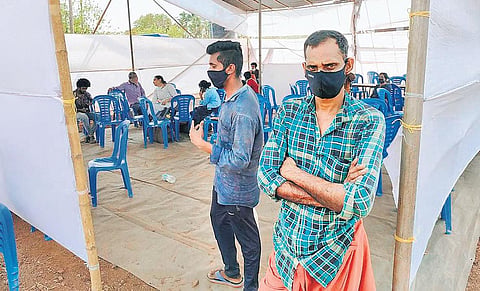 Siju Ramakrishnan, a native of Vilakkupara near Punalur, and Anish Kumar from Kodencheri in Kozhikode, at the reception centre in Thalappady. (Photo| EPS)