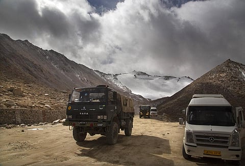 (File) Indian Army truck crosses Chang la pass near Pangong Lake in Ladakh region, (Photo | AP)