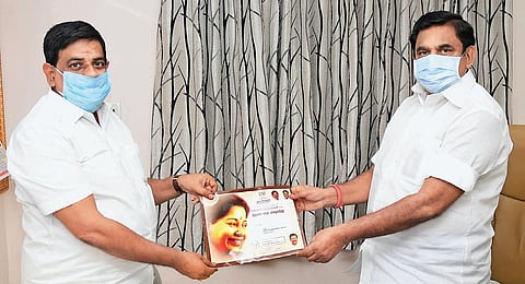 Animal Husbandry Minister Udumalai K Radhakrishnan inviting CM Edappadi K Palaniswami for his daughter’s wedding