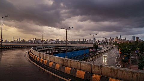 Dark clouds gather in the sky over Marine Drive after cyclone Nisarga made landfall in Mumbai Wednesday June 3 2020. (Photo | PTI)