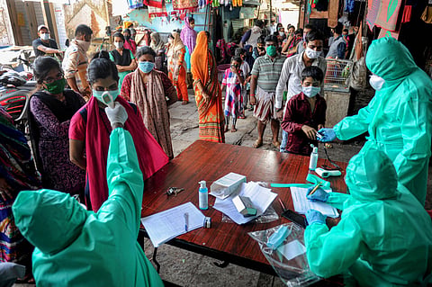 Medics conduct COVID-19 screening of Dharavi residents at a camp (File Photo | PTI)