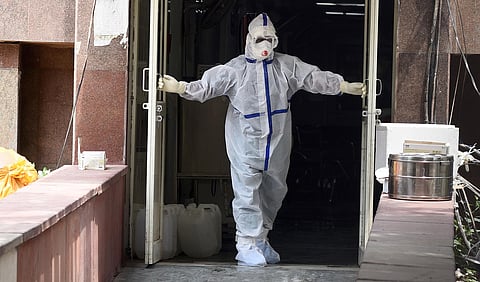 Medical workers in PPE gear outside the COVID-19 ward at Ram Manohar Lohia Hospital. (Photo | Parveen Negi, EPS)