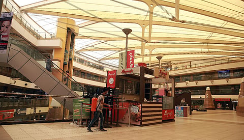 Man sanitizes a Delhi mall ahead of reopening on June 8 as allowed under Unlock 1. (Photo| EPS/ Shekhar Yadav)