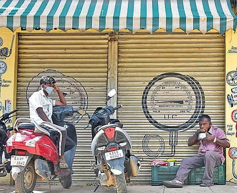 Shops and other establishments remain shut on Bengaluru’s SJP Road after it was listed as a containment zone, on Saturday | Vinod Kumar T