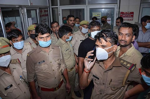 Police personnel at the Hallet Hospital where the body of gangster Vikas Dubey was brought for post-mortem in Kanpur Friday July 10 2020. (Photo | PTI)