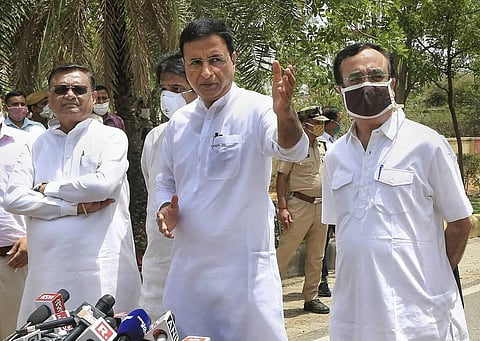 Senior Congress leaders Randeep Surjewala C Ajay Maken R and Avinash Pandey L during a press conference after a MLA's meeting at a hotel in Jaipur Tuesday. (Photo | PTI)