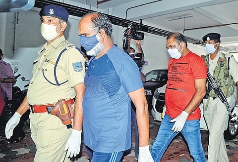 Said Alavi and Mohammed Anwar T M, who were arrested in connection with the gold smuggling case, coming out of the Additional Chief Judicial Magistrate (Economic Offence) Court in Kochi on Thursday | A Sanesh
