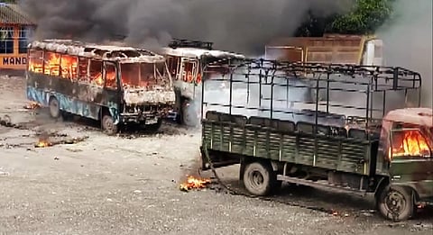 Locals set police vehicles and buses on fireduring a protest against an alleged gang-rape and murder of a girl in Kalagachh in Uttar Dinajpur. (Photo| ANI)