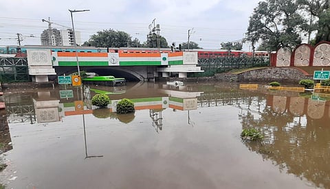 A DTC bus almost submerged at waterlogged Minto Bridge underpass after rains in New Delhi on Sunday. (Photo | Shekhar Yadav, EPS)