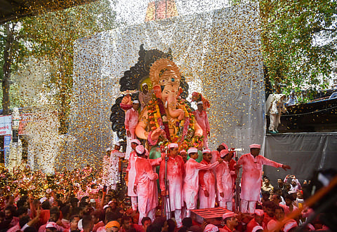 Devotees carry the Ganesha idol of Lalbaugcha Raja for immersion which marks the end of Ganesh Utsav celebrations in Mumbai. (File photo| PTI)