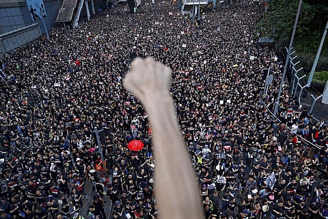 In this June 16, 2019, file photo, protesters march on the streets against an extradition bill in Hong Kong. With Britain the latest country to scrap an extradition treaty with Hong Kong, the focus has returned to concerns over Chinese justice that sparke