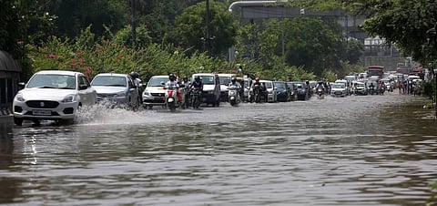 Waterlogging due to heavy rain near Indraprastha Metro Station in New Delhi on Tuesday. (Photo | EPS)