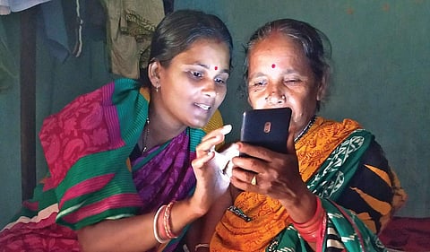 A digital ‘sathi’ teaches how to handle a smartphone