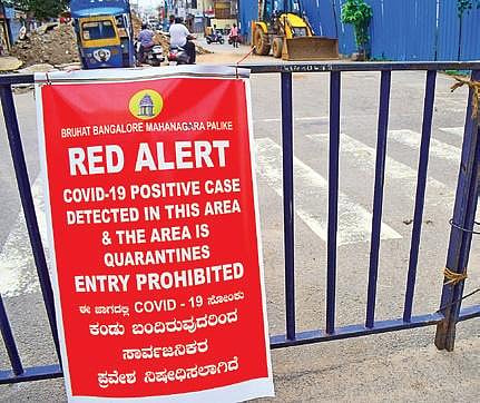 A poster announces sealing down of an area near JC Road in Bengaluru on Tuesday | Pandarinath b