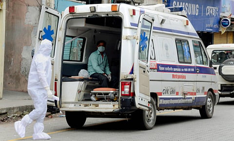 A COVID-19 patient being taken to a hospital at Fancy bazaar area in Guwahati Friday July 3 2020. (Photo | PTI)