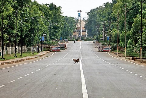 Mahatma Gandhi Marg wears a deserted look during the weekend shutdown in Bhubaneswar on Saturday I express
