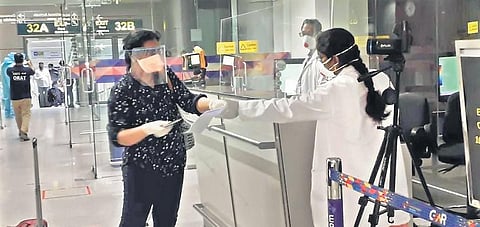 An Indian national seen arriving from Kuwait at the RGIA in Hyderabad in this file photo.