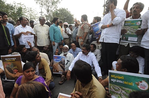 Villagers block a road to stage protest at Amravati on Wednesday. (File photo| Prasant Madugula, EPS)