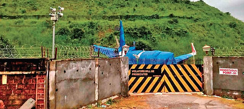The crashed Air India flight seen covered at the crash site at Karipur on Monday.