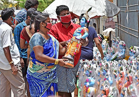Residents shop for Lord Krishna idols at Thiru Vi Ka Nagar on Monday | P Jawahar