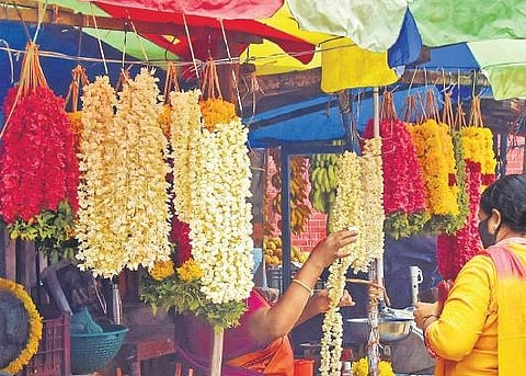 A flower merchant at Connemara market ,B P Deepu