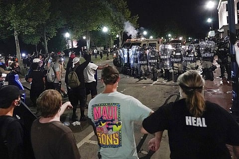 Police clash with protesters near the Kenosha County Courthouse, Monday (Photo | AP)
