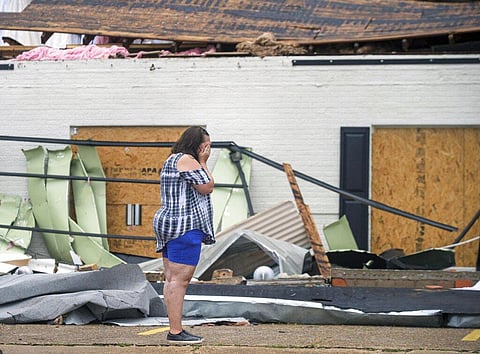 Business owner surveys the damage of Hurricane Laura Friday, Aug. 28, 2020 in Lake Charles. (Photo | AP)