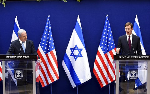Israeli PM Benjamin Netanyahu, left, and White House adviser Jared Kushner make joint statements to the press about the Israeli-United Arab Emirates peace accords, in Jerusalem. (Photo | AP)