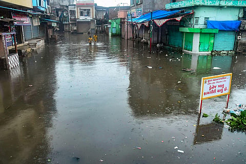 A low-lying area waterlogged following heavy rainfall in Surat. (Photo| PTI)