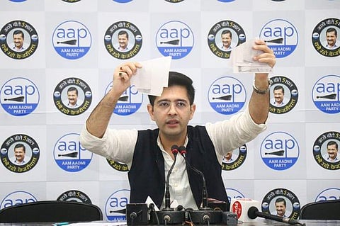 AAP leader Raghav Chadha tears up notice issued by centre that threatened slum dwellers that their houses will be demolished (Photo | Twitter)