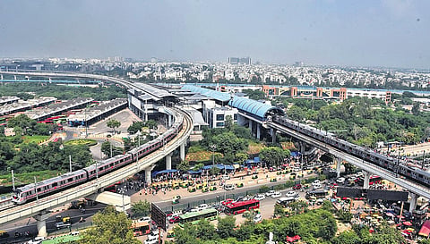 Metro trains moving near Anand Vihar station after the services resumed on Pink & Blue lines on Wednesday (Photo | Parveen Negi, EPS)
