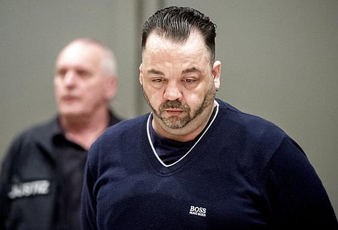 Former nurse Niels Hoegel, right, accused of multiple murder and attempted murder of patients, arrives for a session of the district court in Oldenburg, Germany. (File photo | AP)
