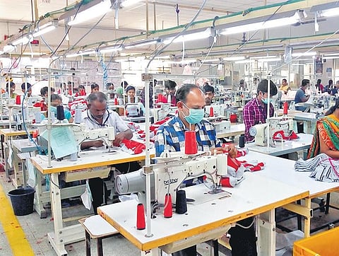 Labourers at work at a garments unit in Tirupur of Tamil Nadu. (Photo | Deepak Sathish/EPS)