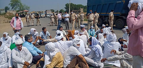Members of various farmer associations stage a protest against Central Government over agriculture related ordinances in Sonipat district. (Photo | PTI)