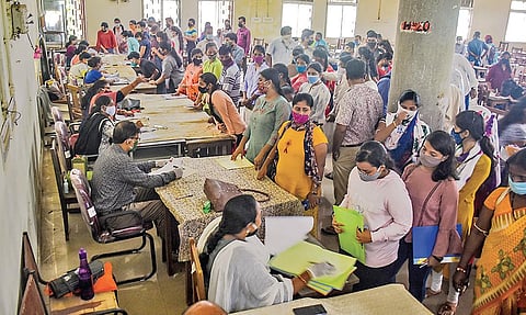 File Image | Students and their guardians during Plus II admission at Ramadevi Higher Secondary School in Bhubaneswar