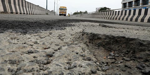 Huge potholes on the Palarivattom Flyover in Edappally, Kochi. (File Photo | EPS)
