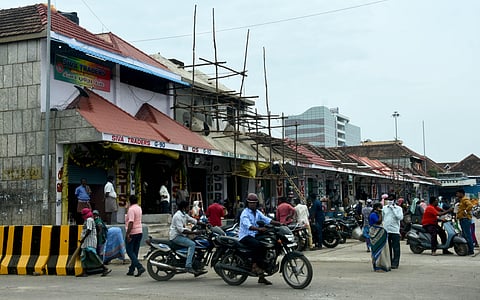 Work on full swing at Koyambedu whole sale vegetable market as the market to be reopened after a break due to pandemic. (Photo | EPS/Ashwin Prasath)