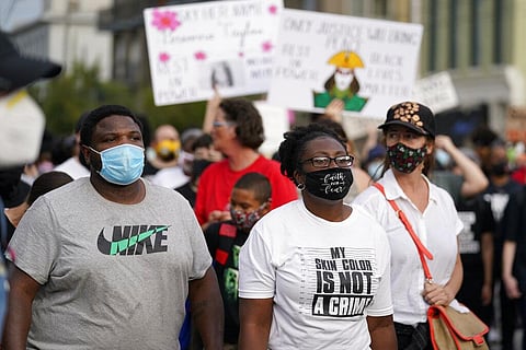 Black Lives Matter protesters march, Friday, Sept. 25, 2020, in Louisville. (Photo | AP)