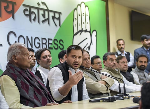 RJD's Tejashwi Yadav along with other Mahagathbandhan leaders during a press conference. (File Photo | PTI)
