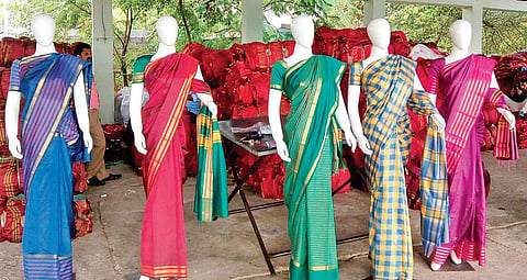 Bathukamma sarees manufactured at the power looms in Sircilla town under Rajanna Sircilla district for distributing them on the occasion of Bathukamma festival in the State (Photo |EPS)