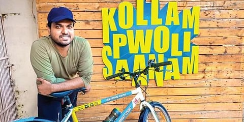 Sherin Paul with his bicycle.