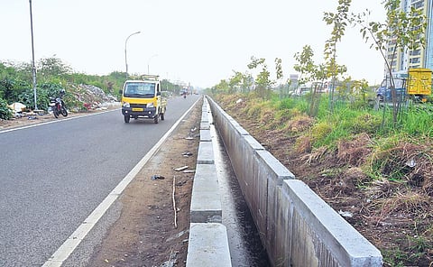 The spot where a woman and her daughter died after they fell into an open drain on the Maduravoyal Bypass service road near Mogappair | Martin Louis