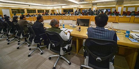 Union Minister for Agriculture Narendra Singh Tomar (2R) along with Union Minister for Commerce and Industry Piyush Goyal (R) and other dignitaries during the meeting with farmers. (Photo | PTI)