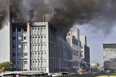 Smoke billows out after a massive fire broke out at the Serum Institute of India in Pune Thursday Jan. 21 2021. (Photo | PTI)