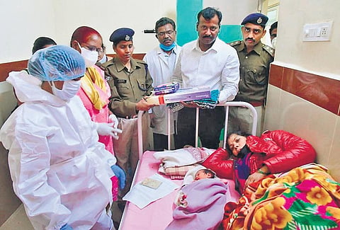 A woman, Anitha Devi Mada, hailing from Kathmandu in Nepal, with her newborn at the Khammam district headquarters hospital, on Thursday