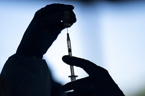 A medical staff member prepares the Pfizer-BioNTech COVID-19 vaccine. (Photo | AP)