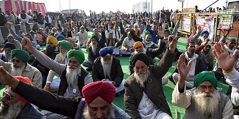 Farmers shout slogans during a protest against farm law, at Delhi-Ghazipur border. (Photo | ANI)